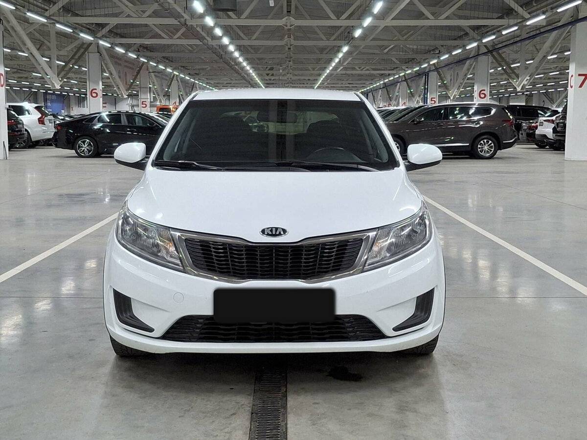 Kia Rio с пробегом — 2014 год. Фото: #1