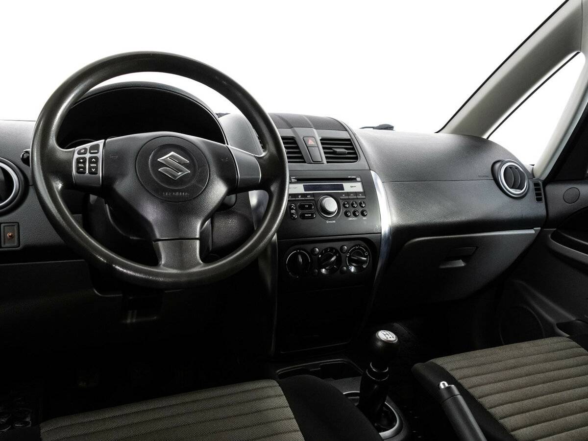 Suzuki SX4 с пробегом — 2012 год. Фото: #10