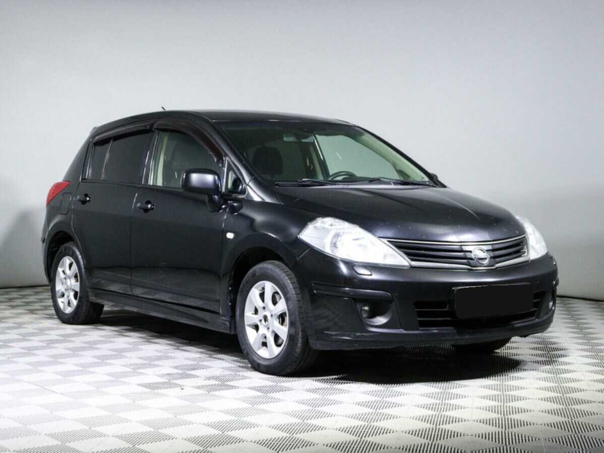 Nissan Tiida с пробегом — 2013 год. Фото: #2