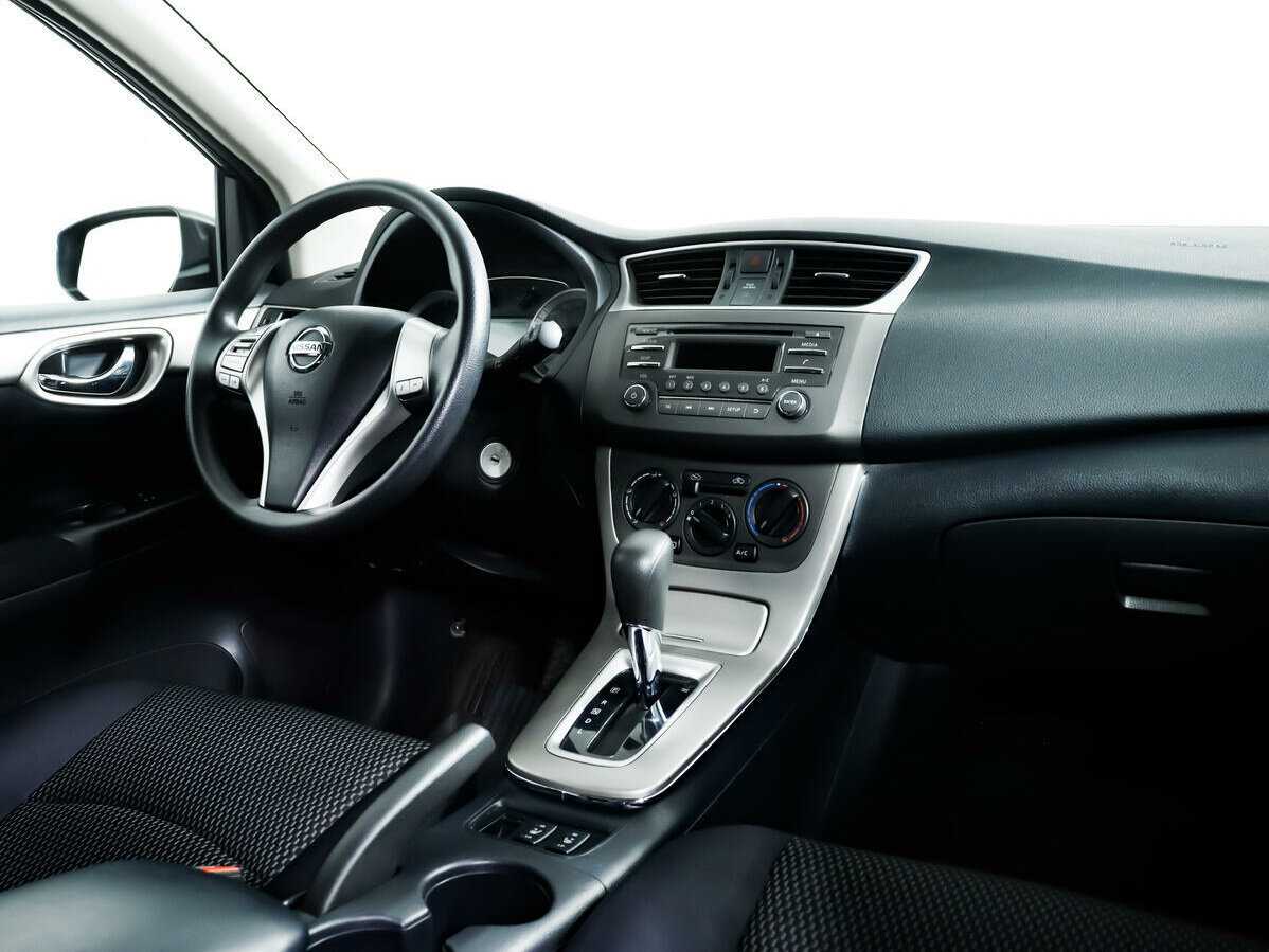 Nissan Tiida с пробегом — 2015 год. Фото: #6
