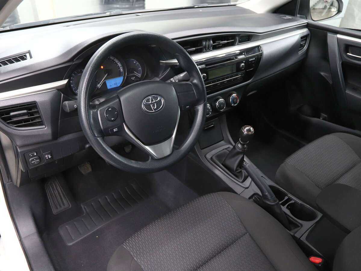 Toyota Corolla с пробегом — 2014 год. Фото: #6