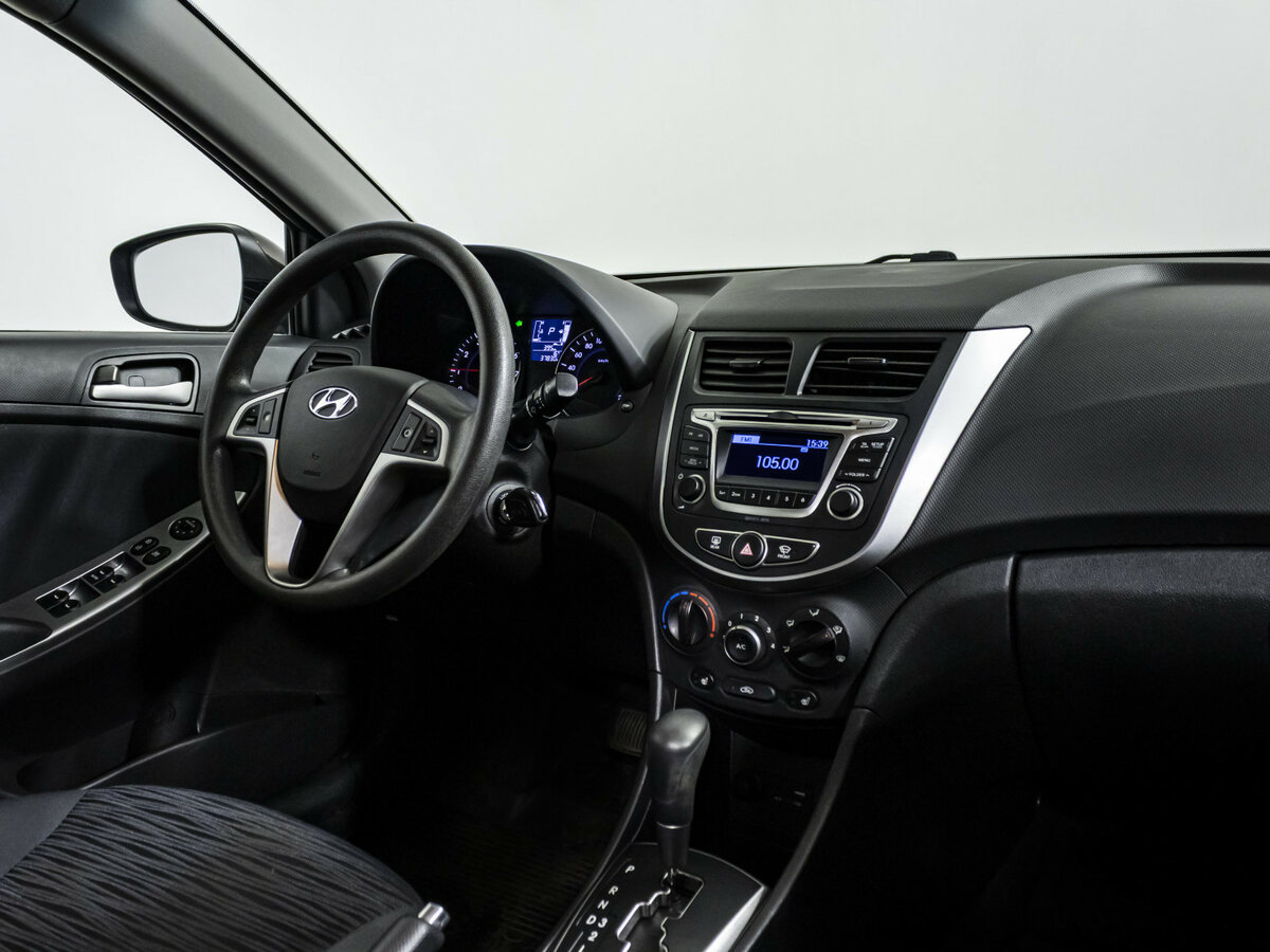 Hyundai Solaris с пробегом — 2015 год. Фото: #7