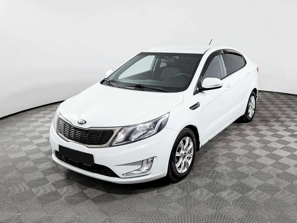 Kia Rio с пробегом — 2013 год. Посмотреть фото