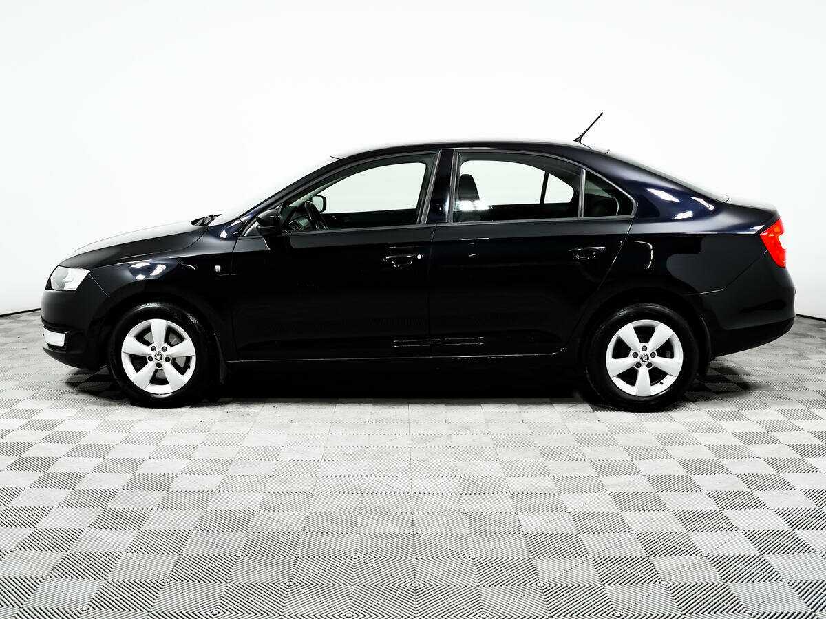 Skoda Rapid с пробегом — 2014 год. Фото: #7