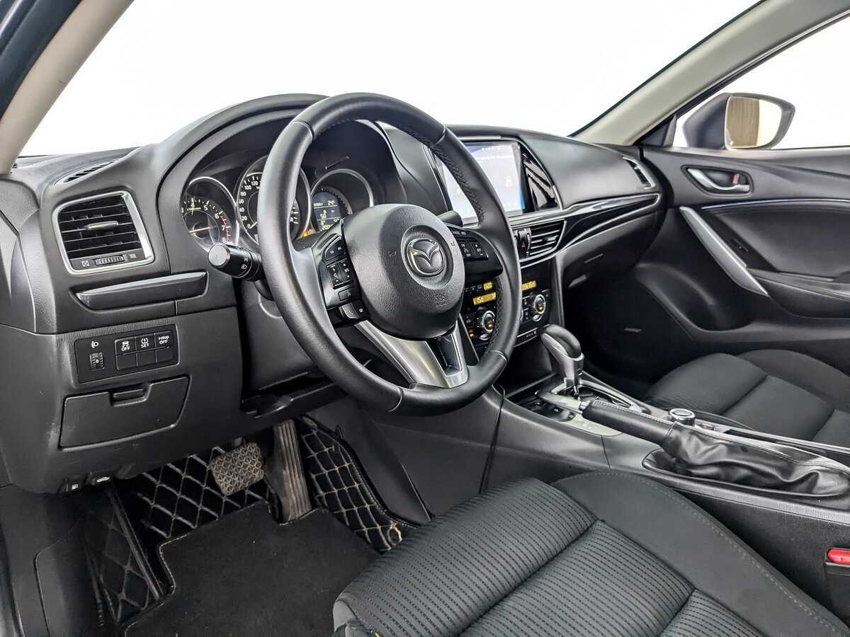 Mazda 6 с пробегом — 2014 год. Фото: #13
