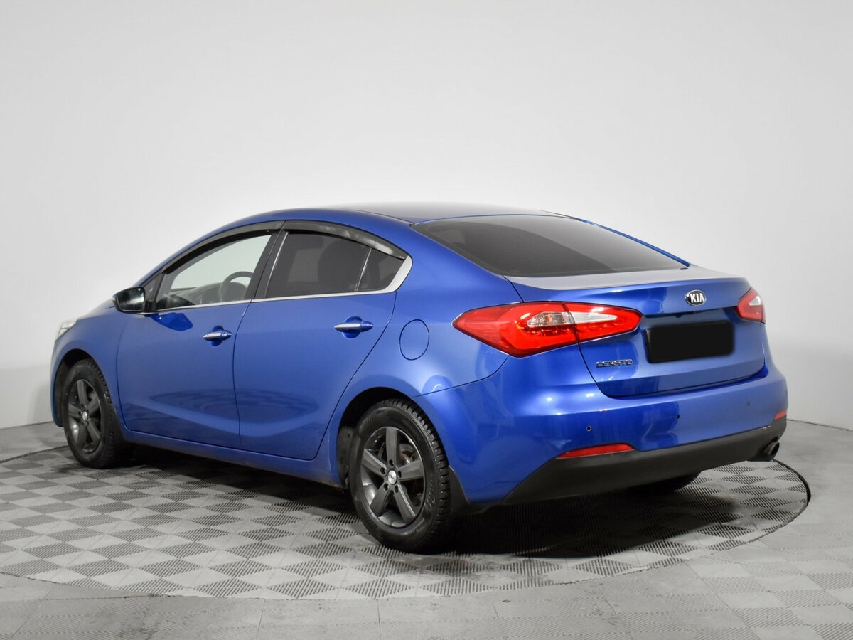 Kia Cerato с пробегом — 2014 год. Фото: #6