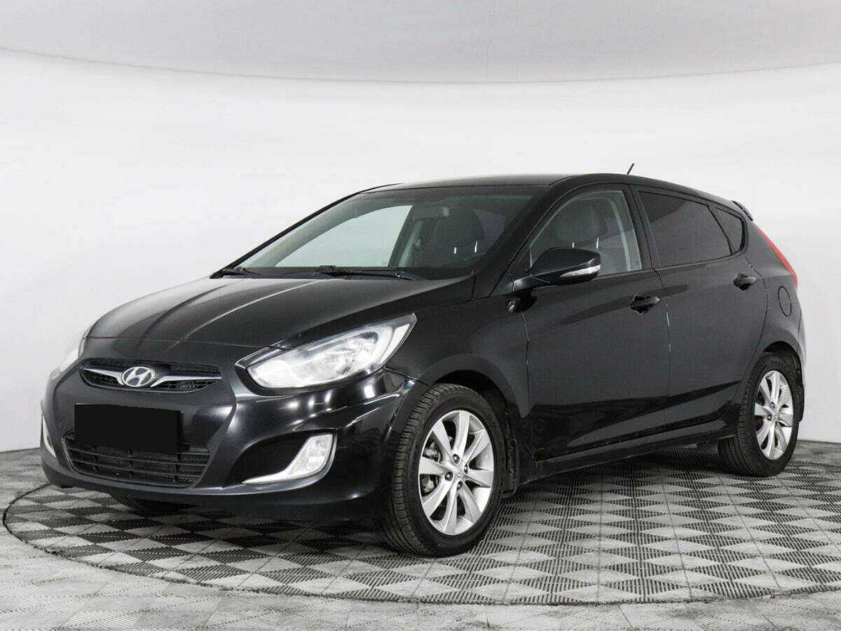 Hyundai Solaris с пробегом — 2012 год. Фото: #0