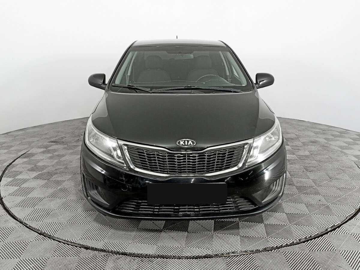 Kia Rio с пробегом — 2012 год. Фото: #1