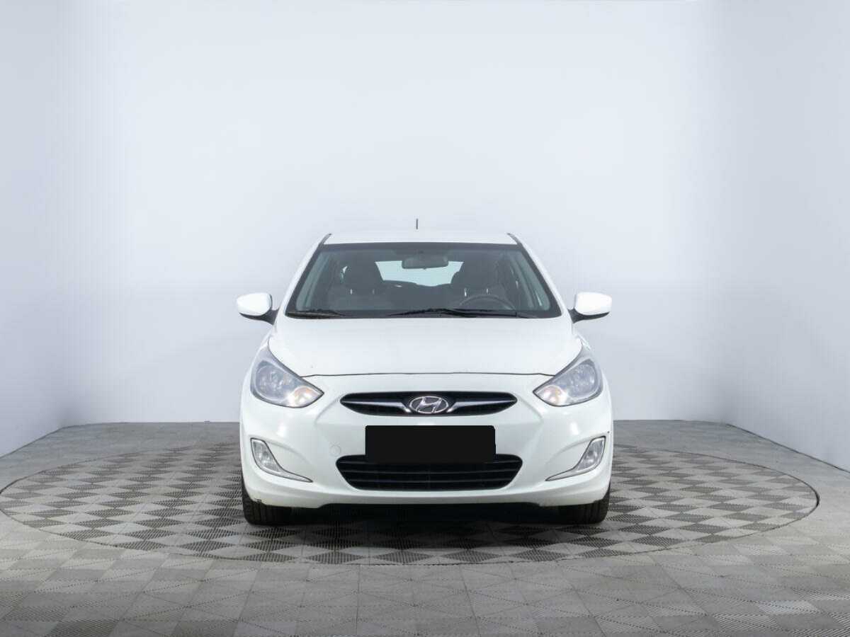 Hyundai Solaris с пробегом — 2014 год. Фото: #1