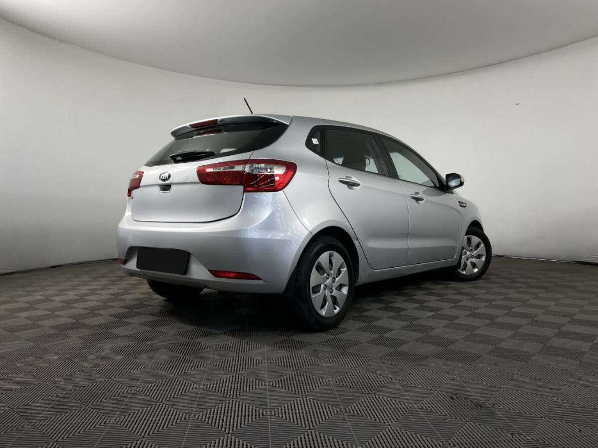 Kia Rio с пробегом — 2013 год. Фото: #5
