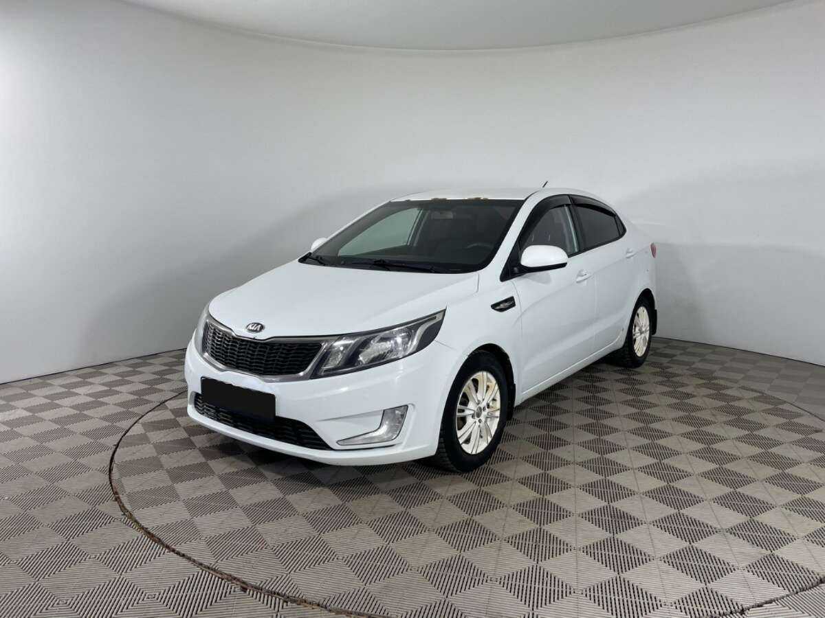 Kia Rio с пробегом — 2013 год. Фото: #0