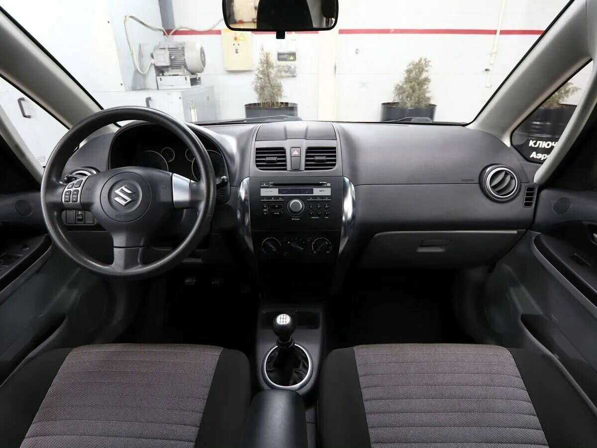 Suzuki SX4 с пробегом — 2013 год. Фото: #11