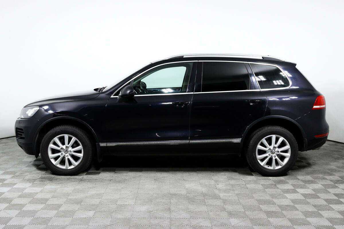 Volkswagen Touareg с пробегом — 2012 год. Фото: #6