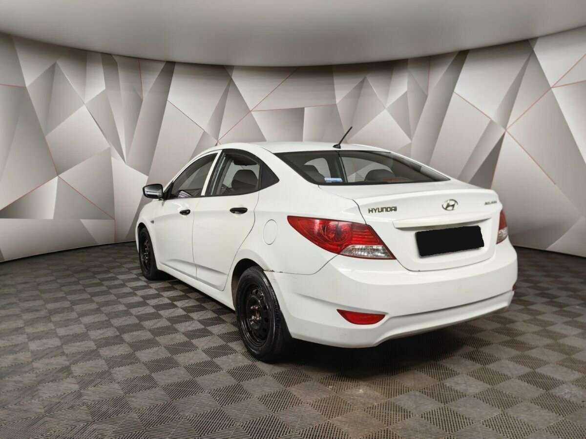 Hyundai Solaris с пробегом — 2013 год. Фото: #3