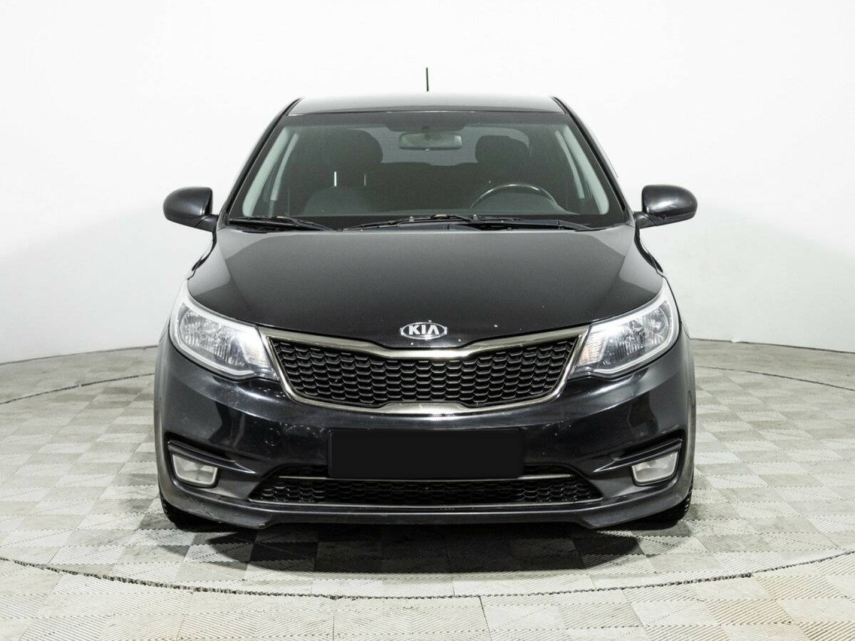 Kia Rio с пробегом — 2015 год. Фото: #1