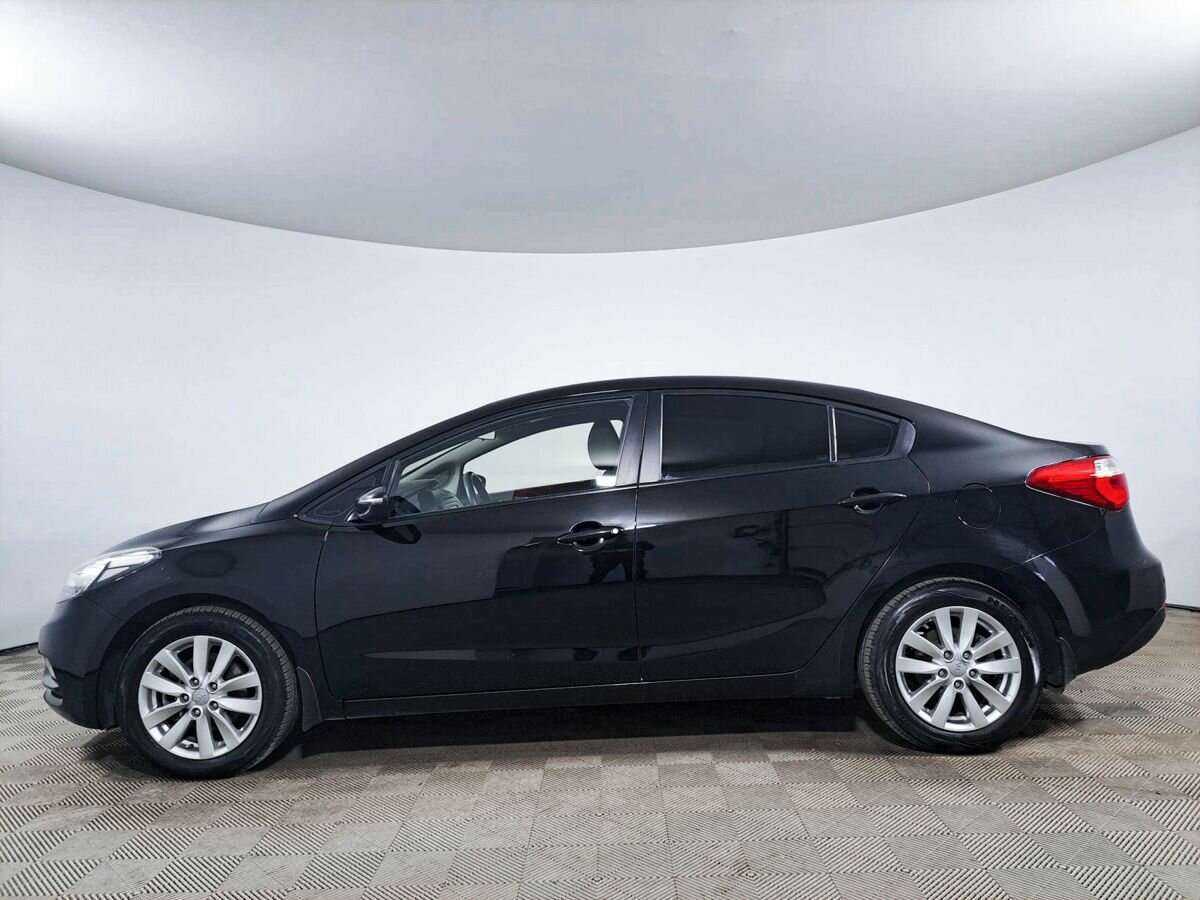 Kia Cerato с пробегом — 2014 год. Фото: #7