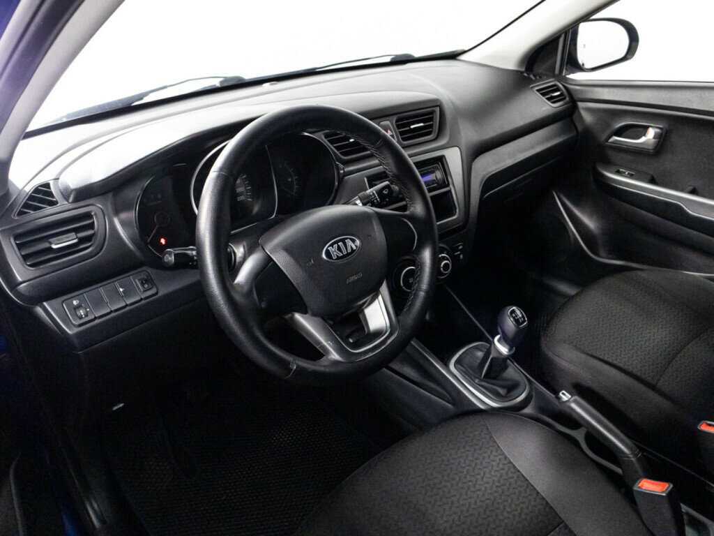 Kia Rio с пробегом — 2013 год. Фото: #10
