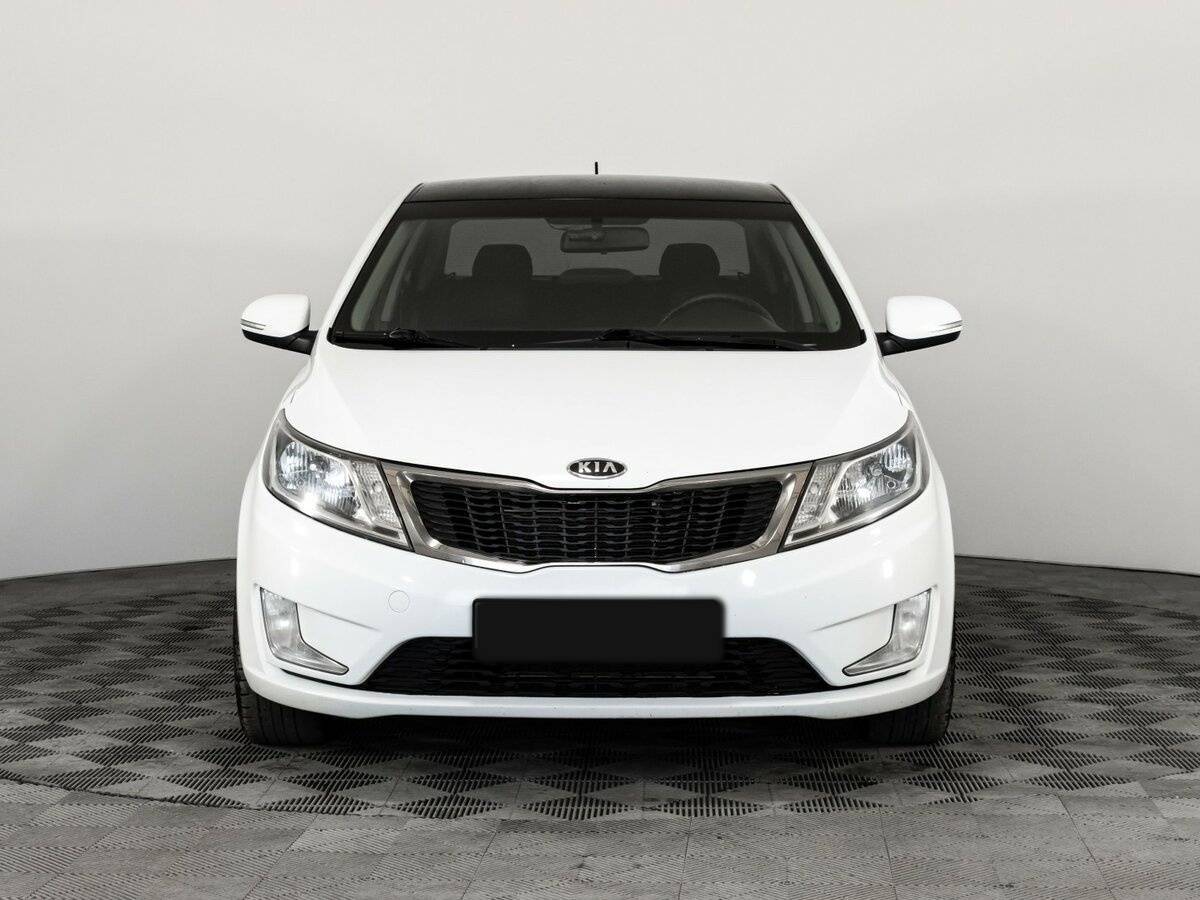 Kia Rio с пробегом — 2012 год. Фото: #1