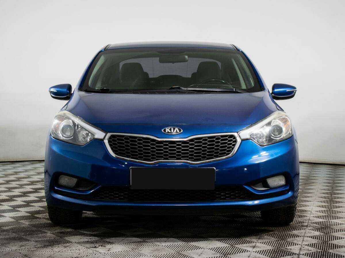 Kia Cerato с пробегом — 2014 год. Фото: #1