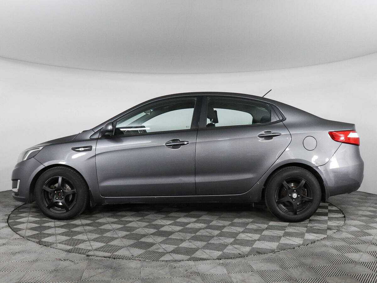 Kia Rio с пробегом — 2013 год. Фото: #7