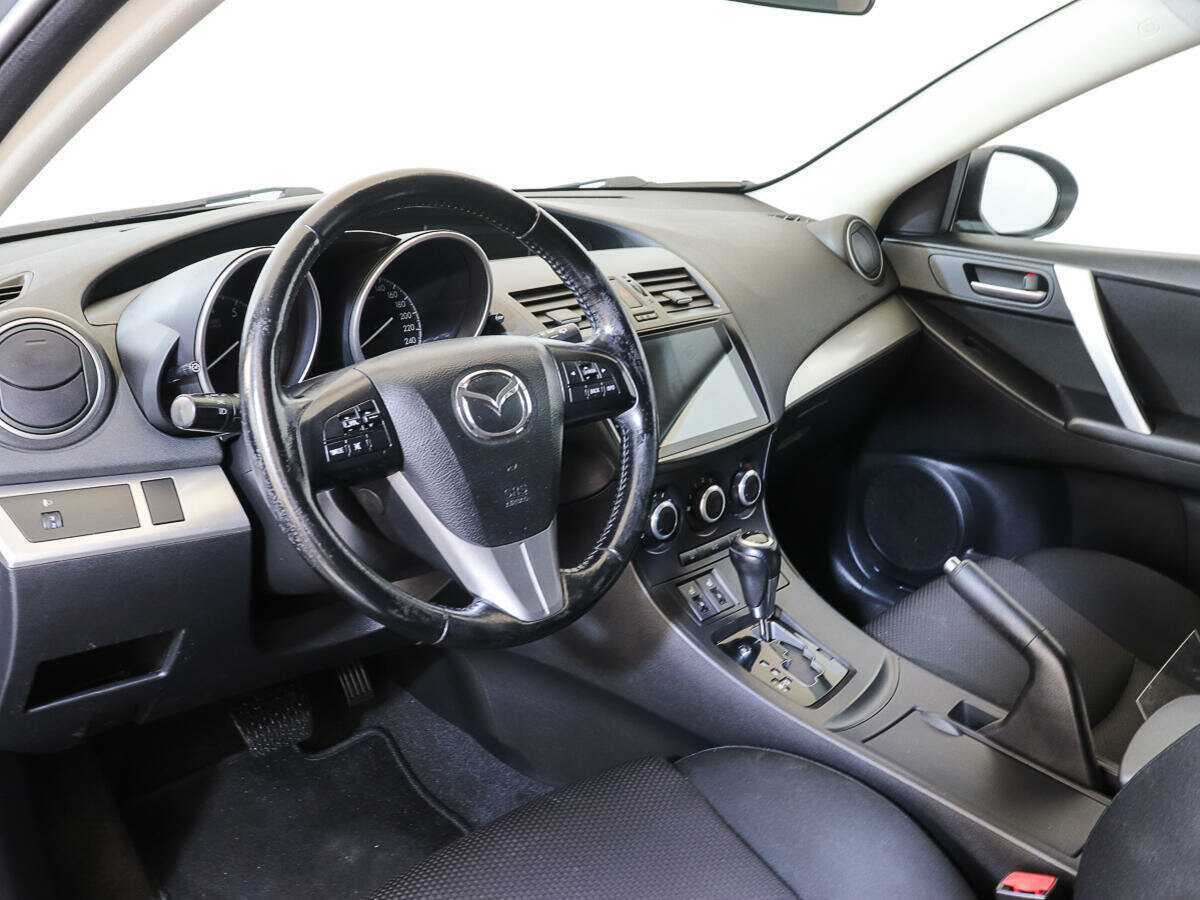 Mazda 3 с пробегом — 2012 год. Фото: #11