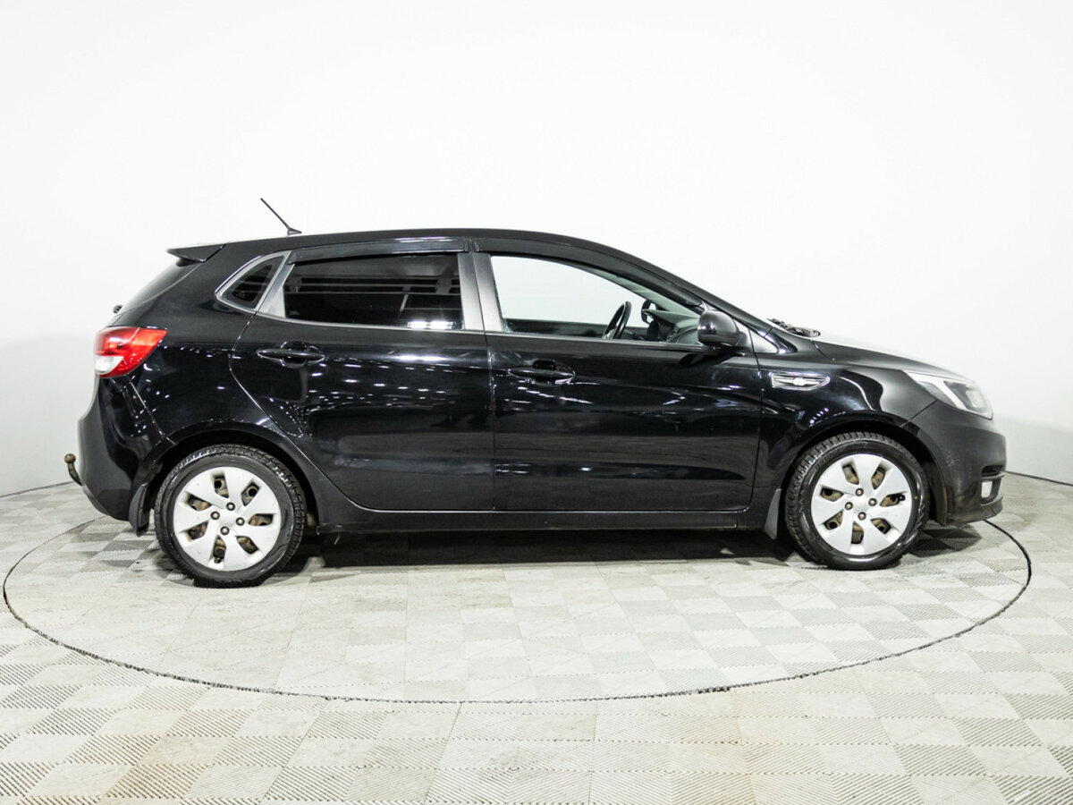 Kia Rio с пробегом — 2015 год. Фото: #3