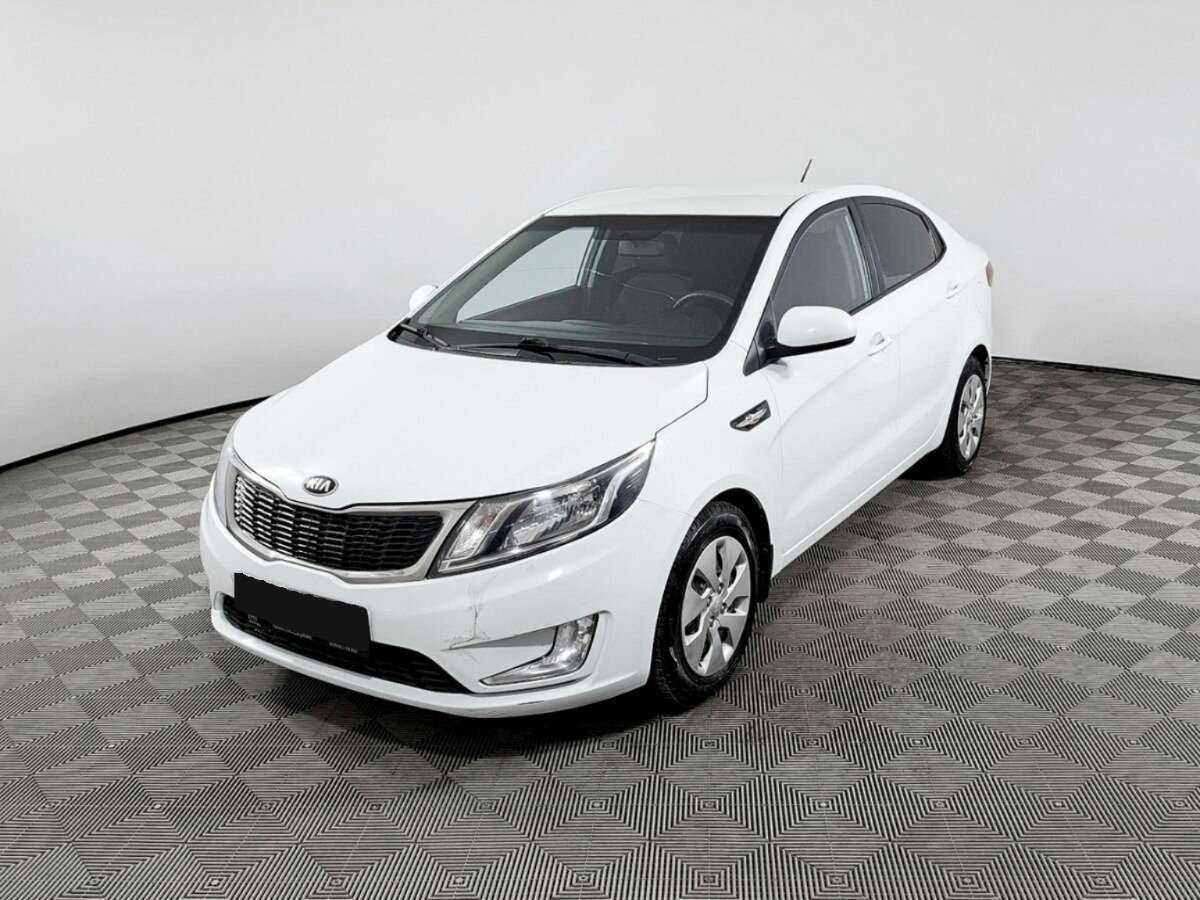 Kia Rio с пробегом — 2013 год. Посмотреть фото