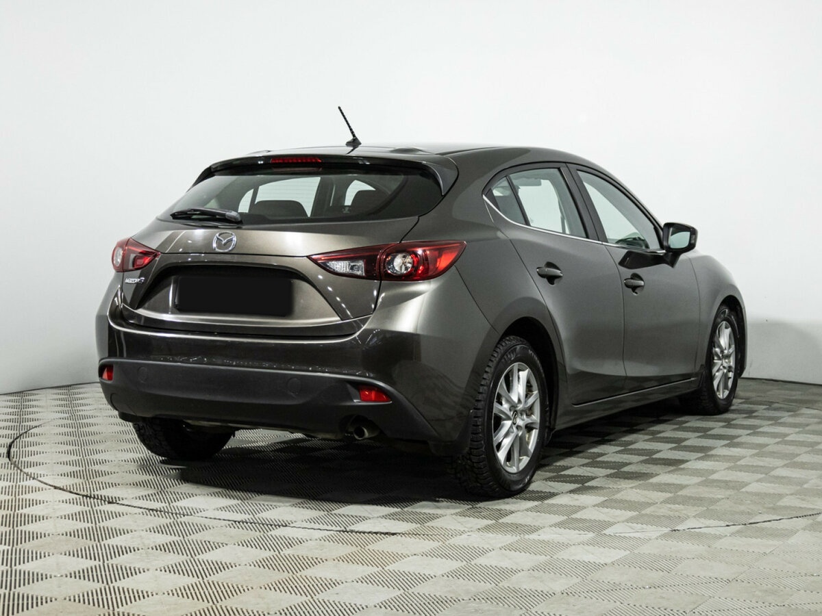 Mazda 3 с пробегом — 2013 год. Фото: #4