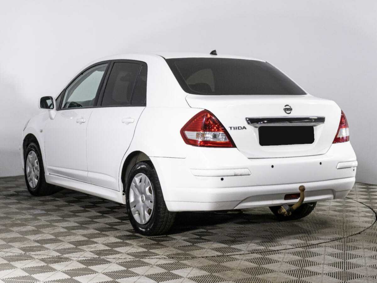 Nissan Tiida с пробегом — 2013 год. Фото: #6