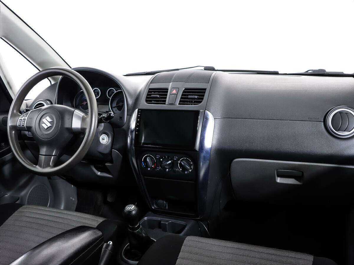Suzuki SX4 с пробегом — 2013 год. Фото: #8