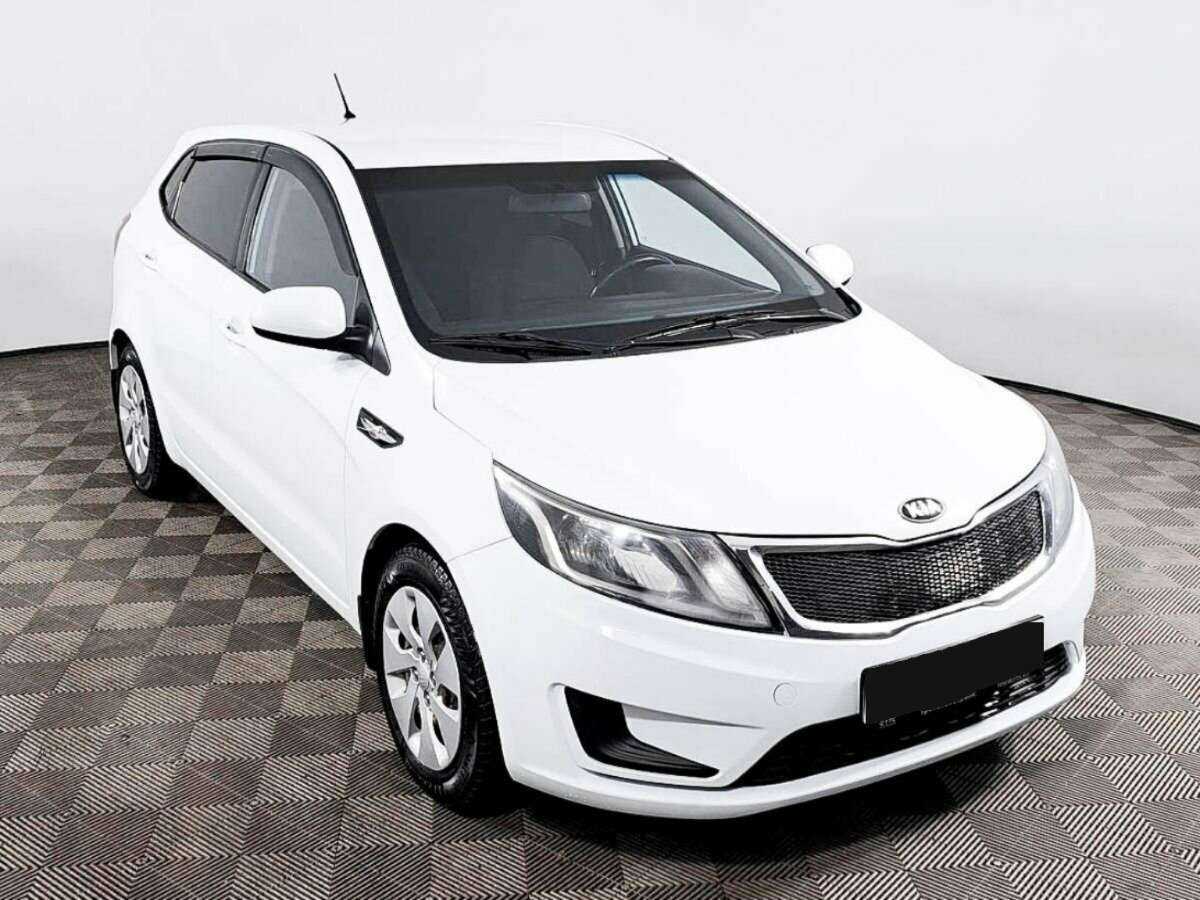 Kia Rio с пробегом — 2014 год. Фото: #2