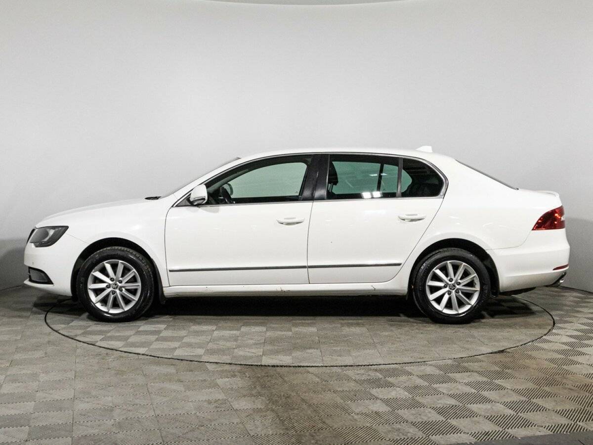 Skoda Superb с пробегом — 2013 год. Фото: #7