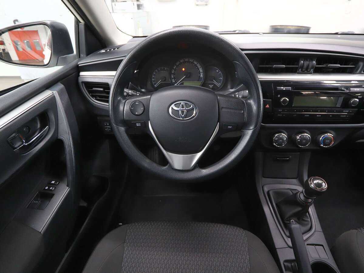 Toyota Corolla с пробегом — 2014 год. Фото: #15