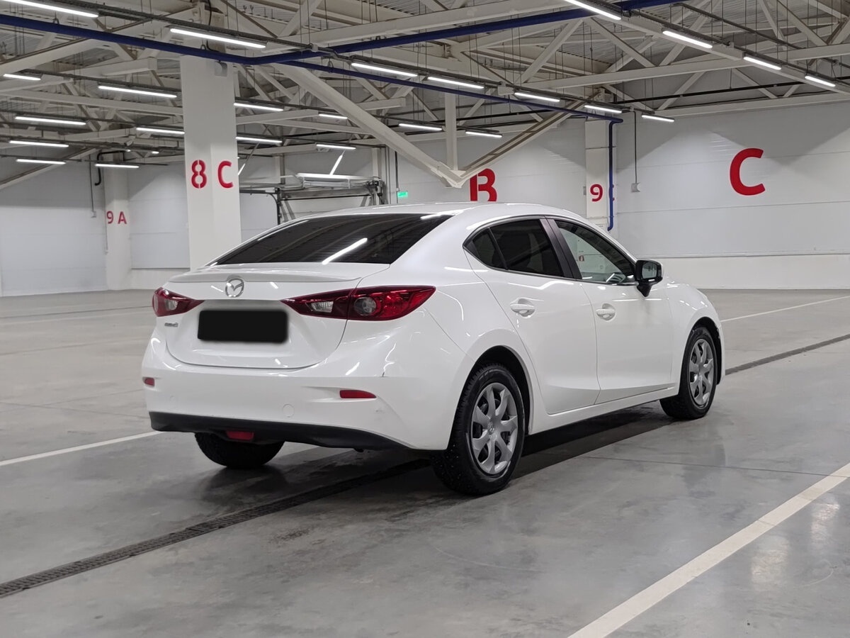 Mazda 3 с пробегом — 2014 год. Фото: #4