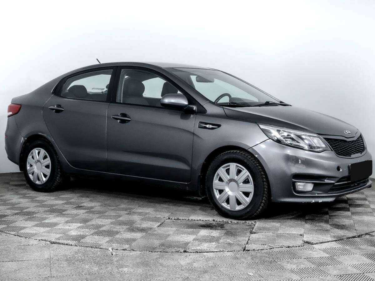 Kia Rio с пробегом — 2015 год. Фото: #2