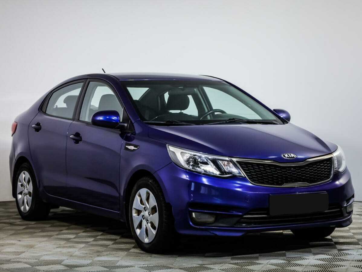Kia Rio с пробегом — 2015 год. Фото: #1