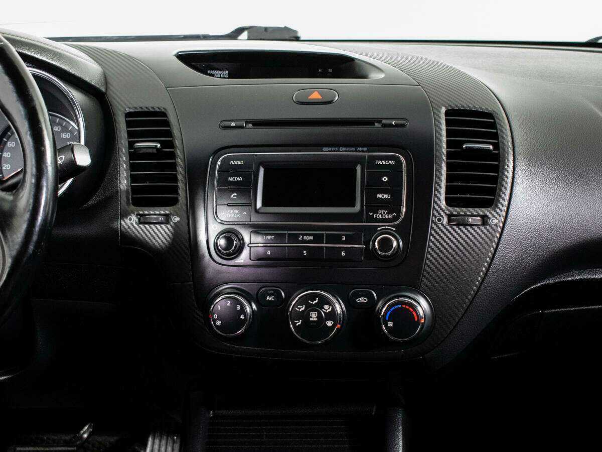 Kia Cerato с пробегом — 2014 год. Фото: #10