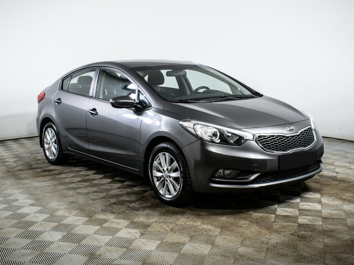 Kia Cerato с пробегом — 2015 год. Фото: #2