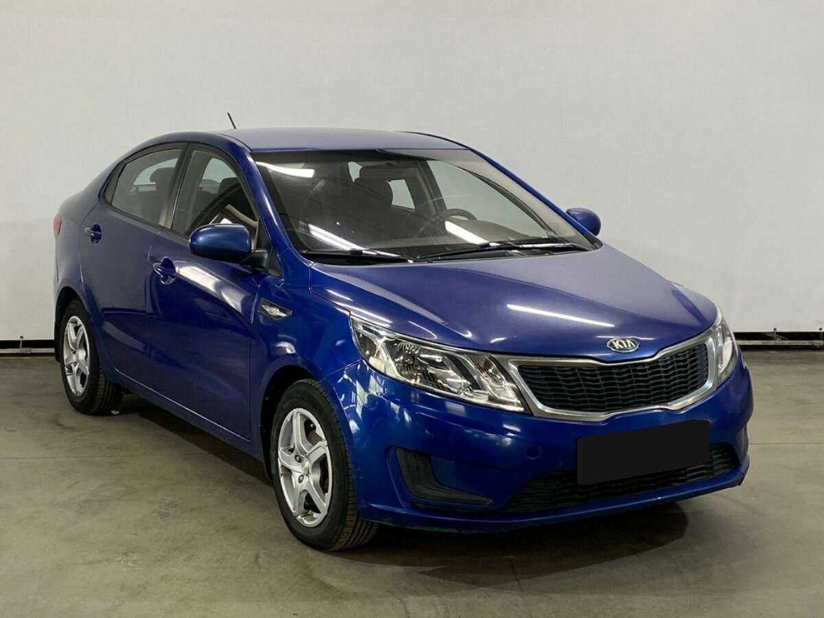 Kia Rio с пробегом — 2013 год. Фото: #2