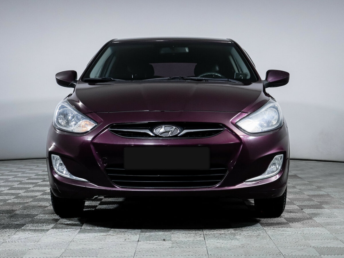 Hyundai Solaris с пробегом — 2013 год. Фото: #1