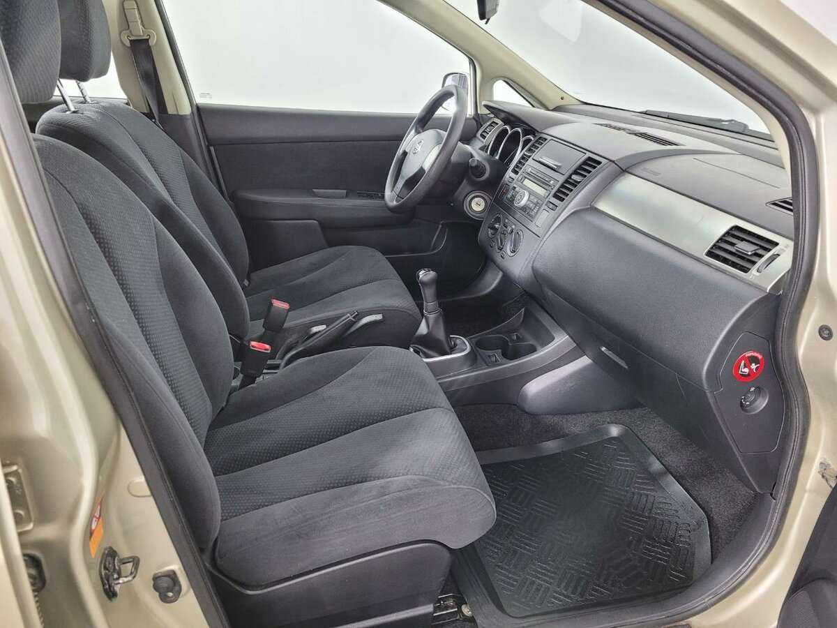 Nissan Tiida с пробегом — 2013 год. Фото: #13