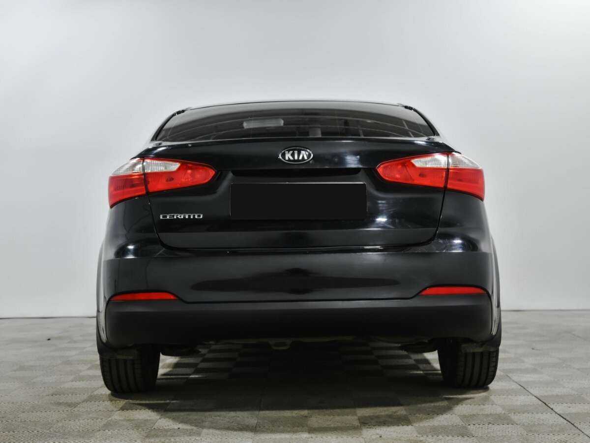 Kia Cerato с пробегом — 2014 год. Фото: #3