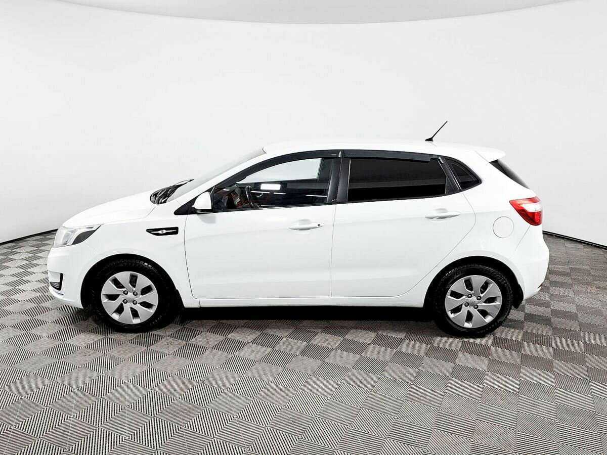 Kia Rio с пробегом — 2014 год. Фото: #7
