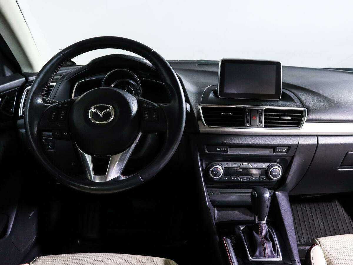 Mazda 3 с пробегом — 2014 год. Фото: #9