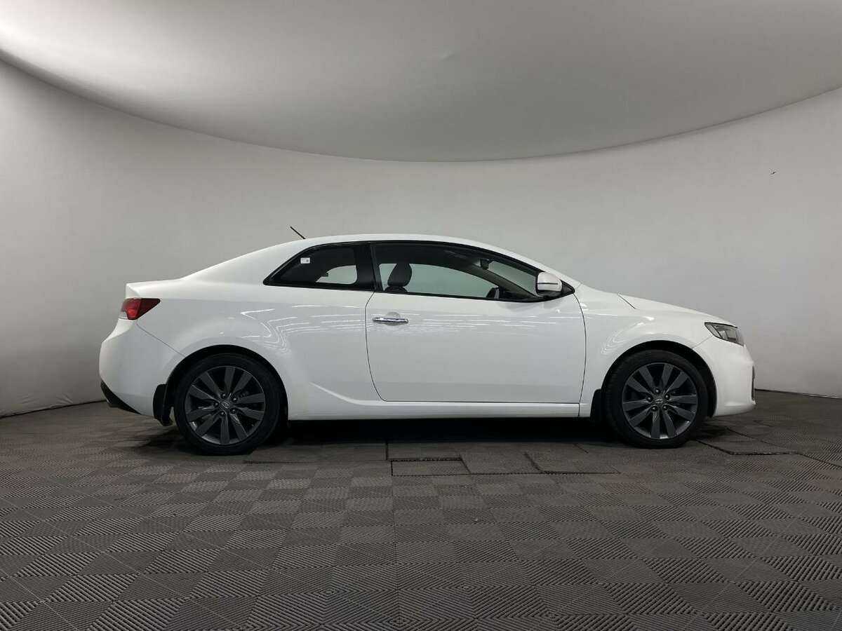 Kia Cerato с пробегом — 2012 год. Фото: #3