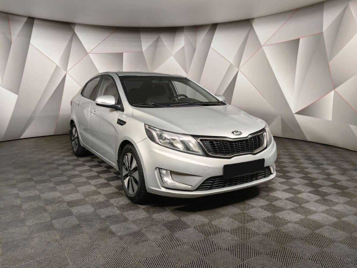 Kia Rio с пробегом — 2014 год. Фото: #1