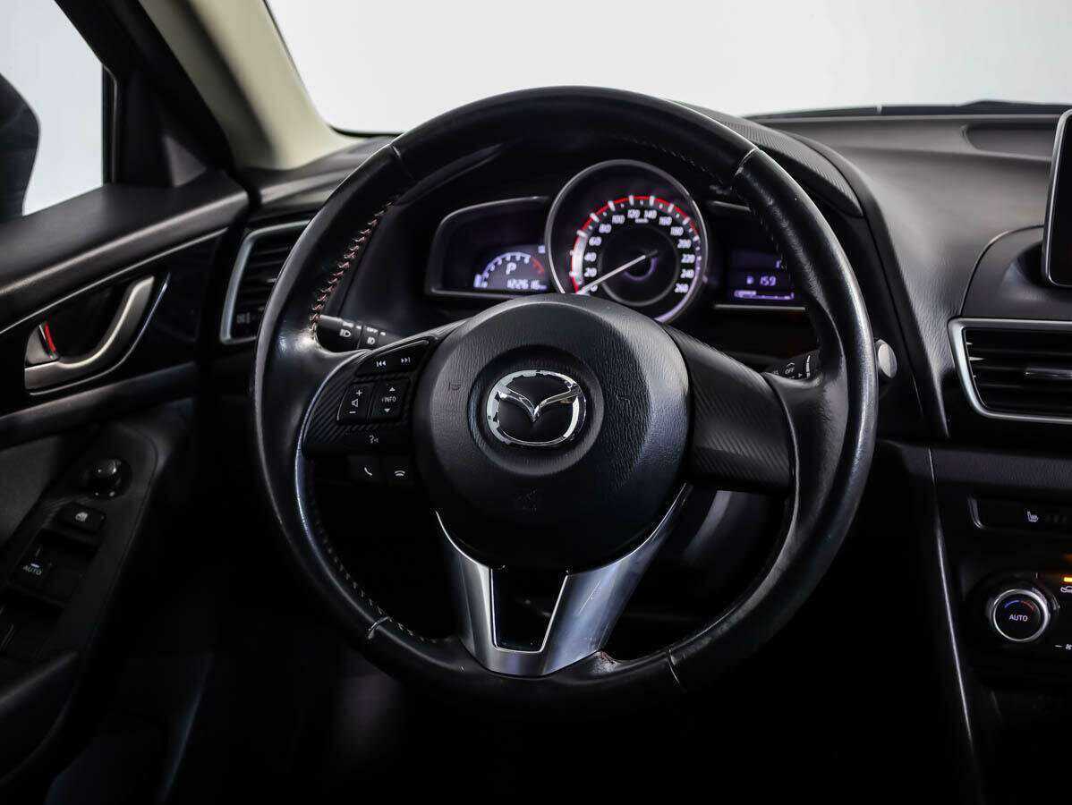 Mazda 3 с пробегом — 2014 год. Фото: #9