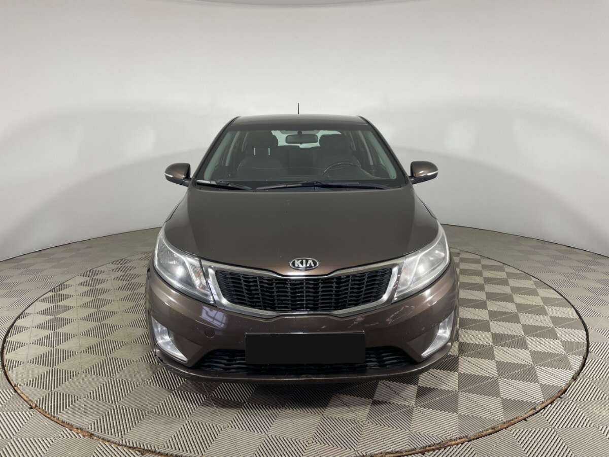 Kia Rio с пробегом — 2014 год. Фото: #1