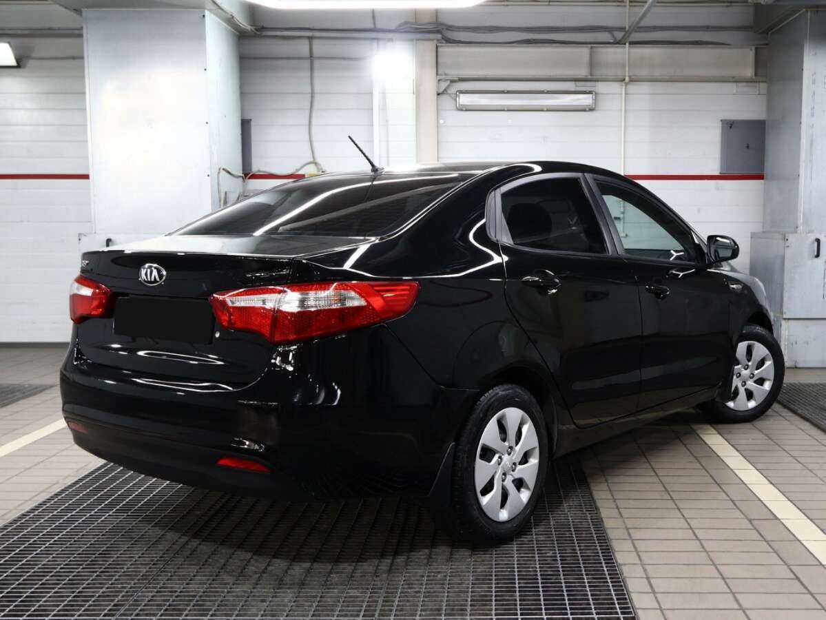 Kia Rio с пробегом — 2013 год. Фото: #1