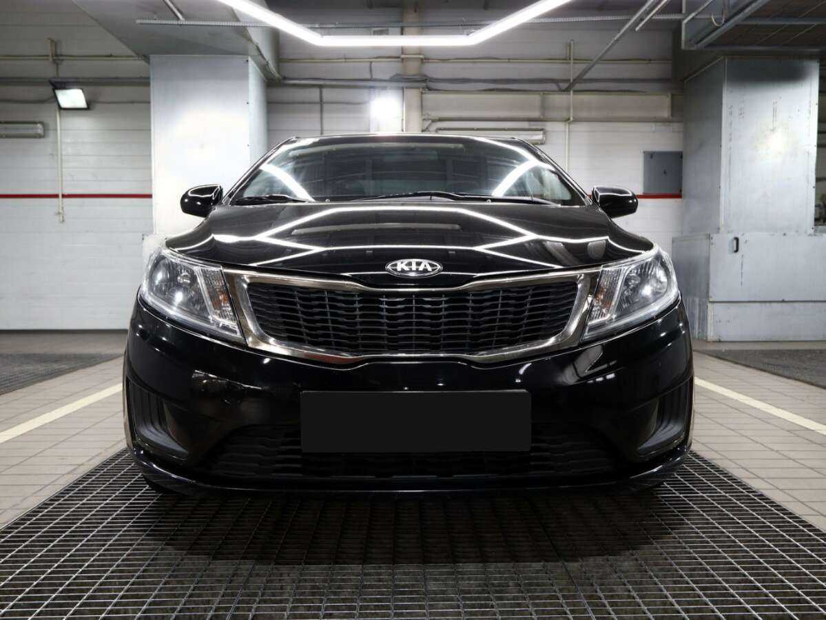 Kia Rio с пробегом — 2013 год. Фото: #2